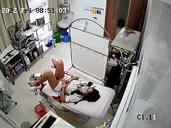 Real_hidden_camera_in_gynecological_cabinet_35 Passionate Redhead & Asian Love in a Hot Threesome Encounter